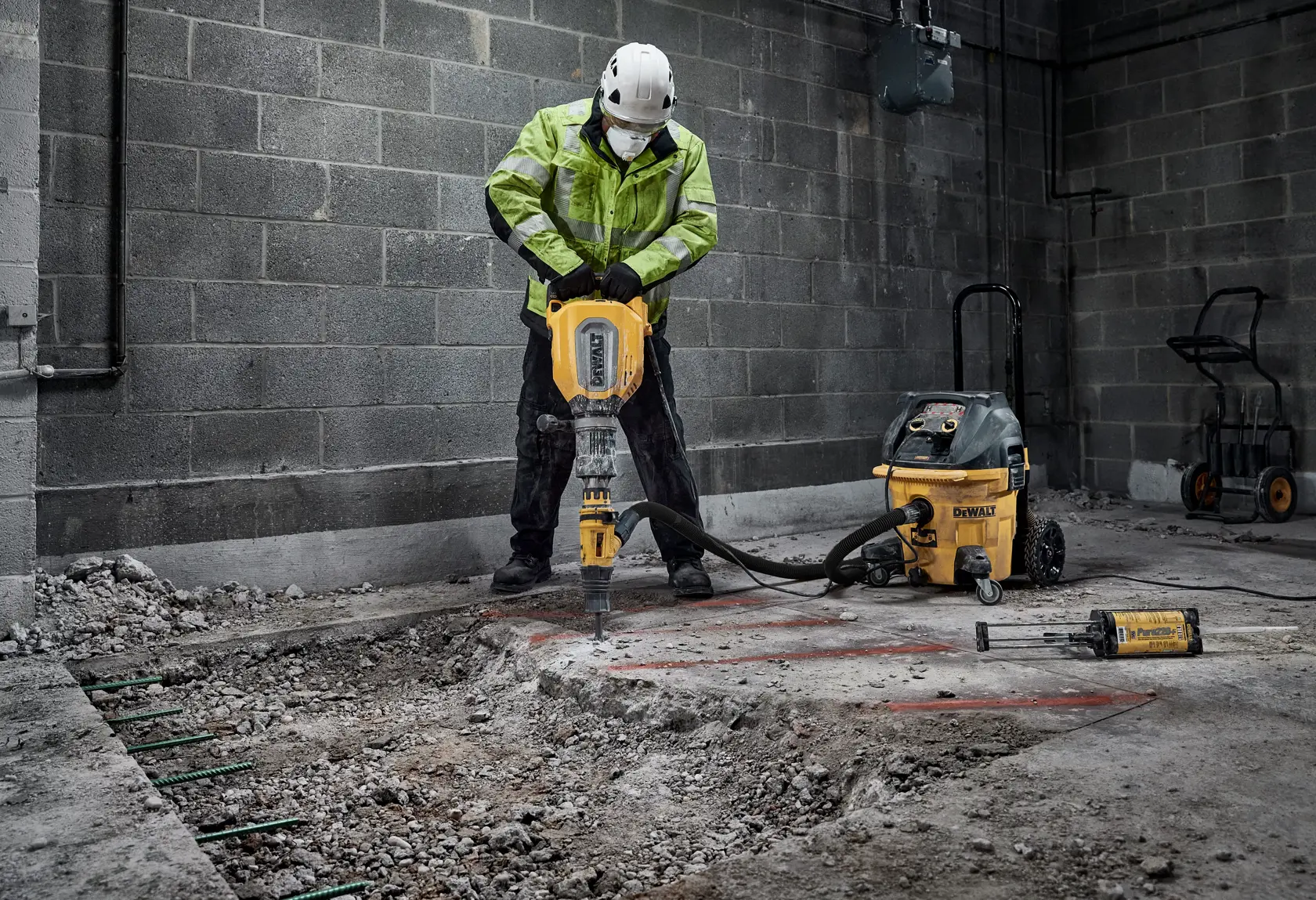 DEWALT D25911K yellow and black demolition hammer photographed on a white background.