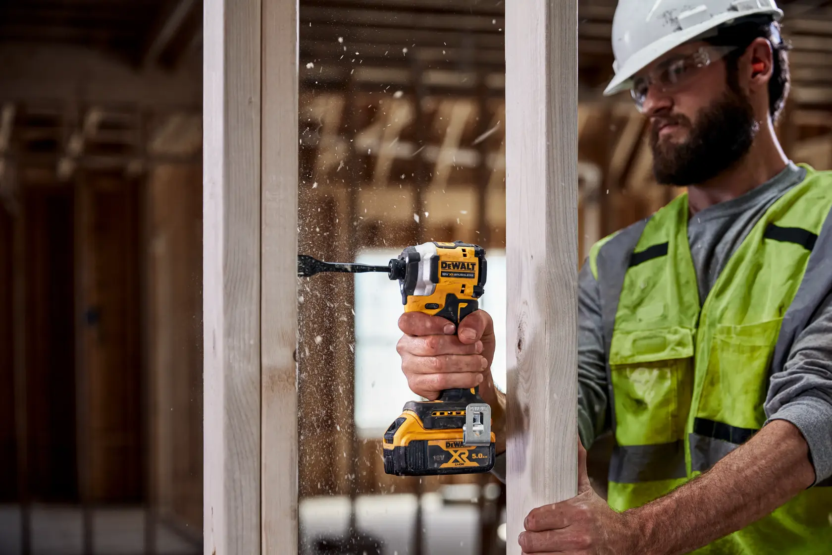 DEWALT drill used on wood. Models: DCF850N, DCZ2050P2T-XE, DCZ401P3-XE.