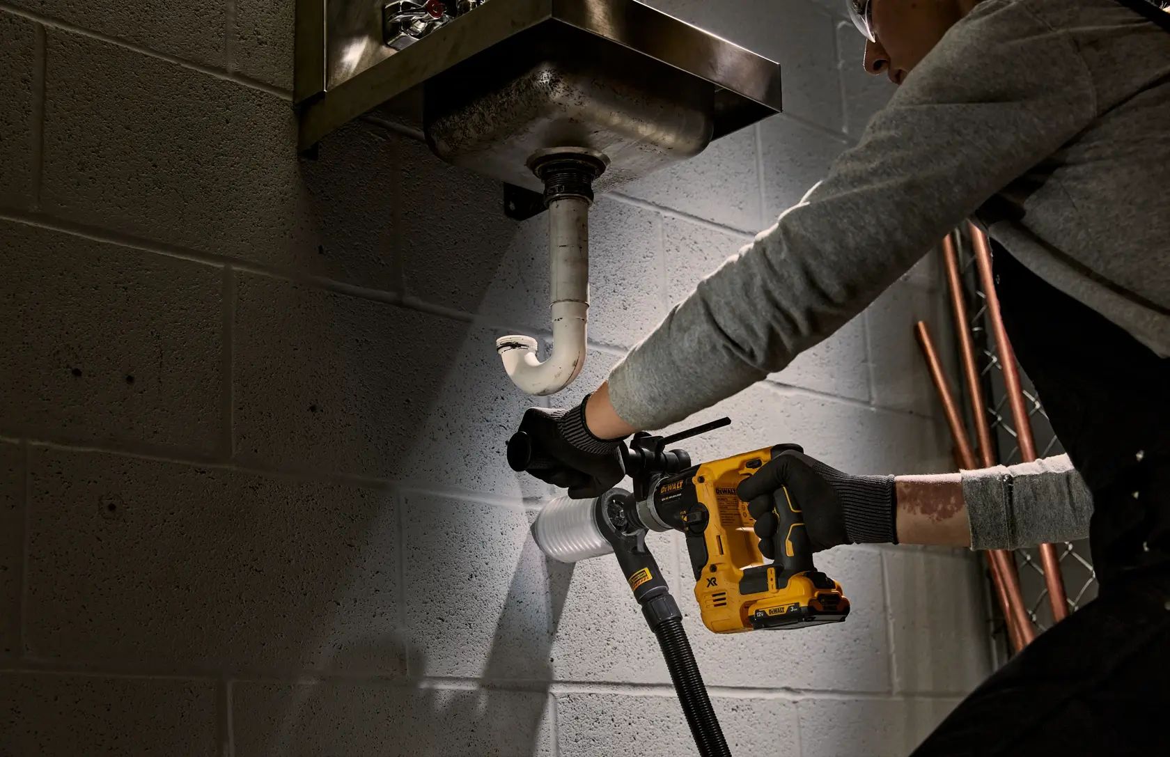 DEWALT DCH072NT, DCH072N, DCH072N-XJ used for work under sink. Photography product category.
