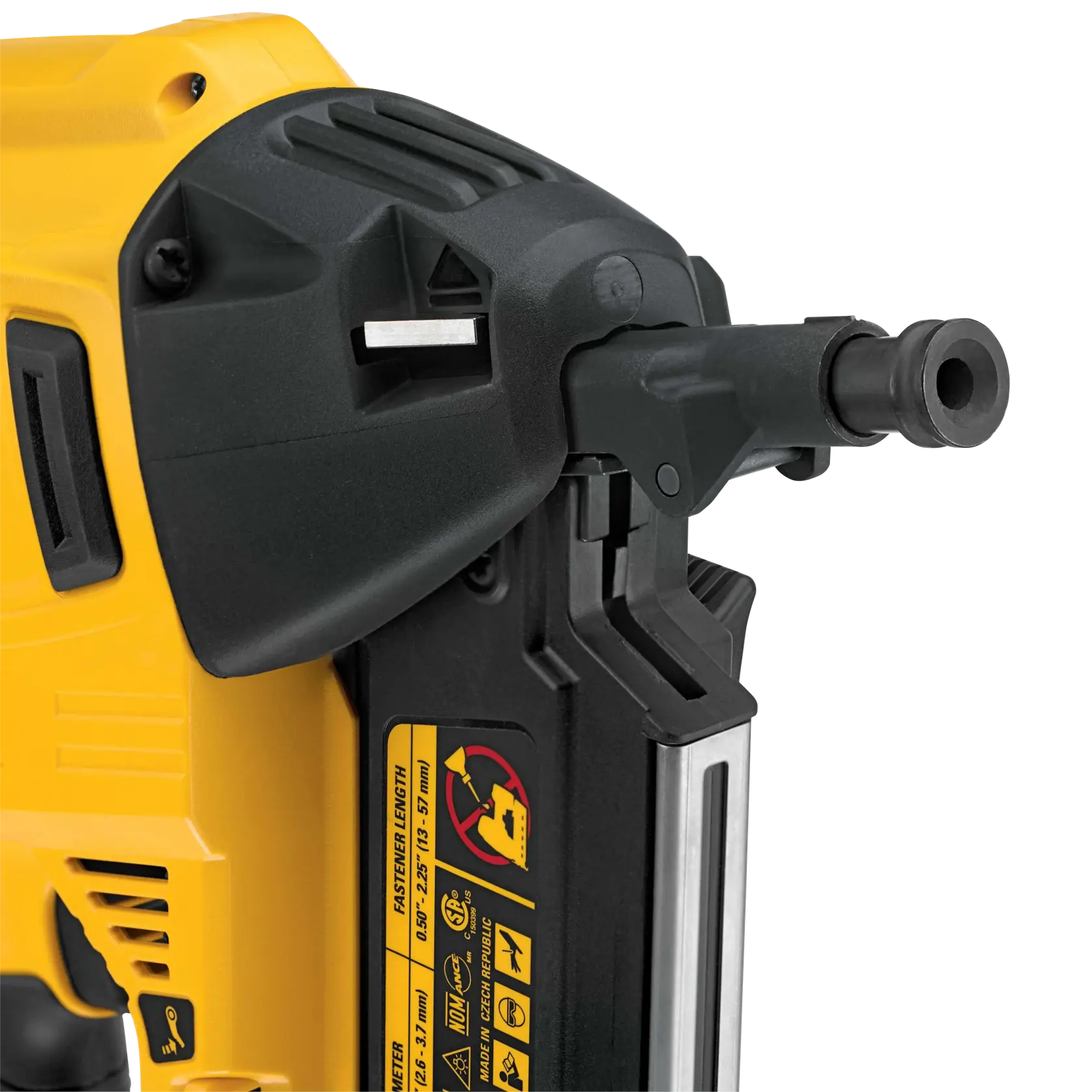 Close-up of a DEWALT nail gun showing the nozzle and safety instructions on the side.