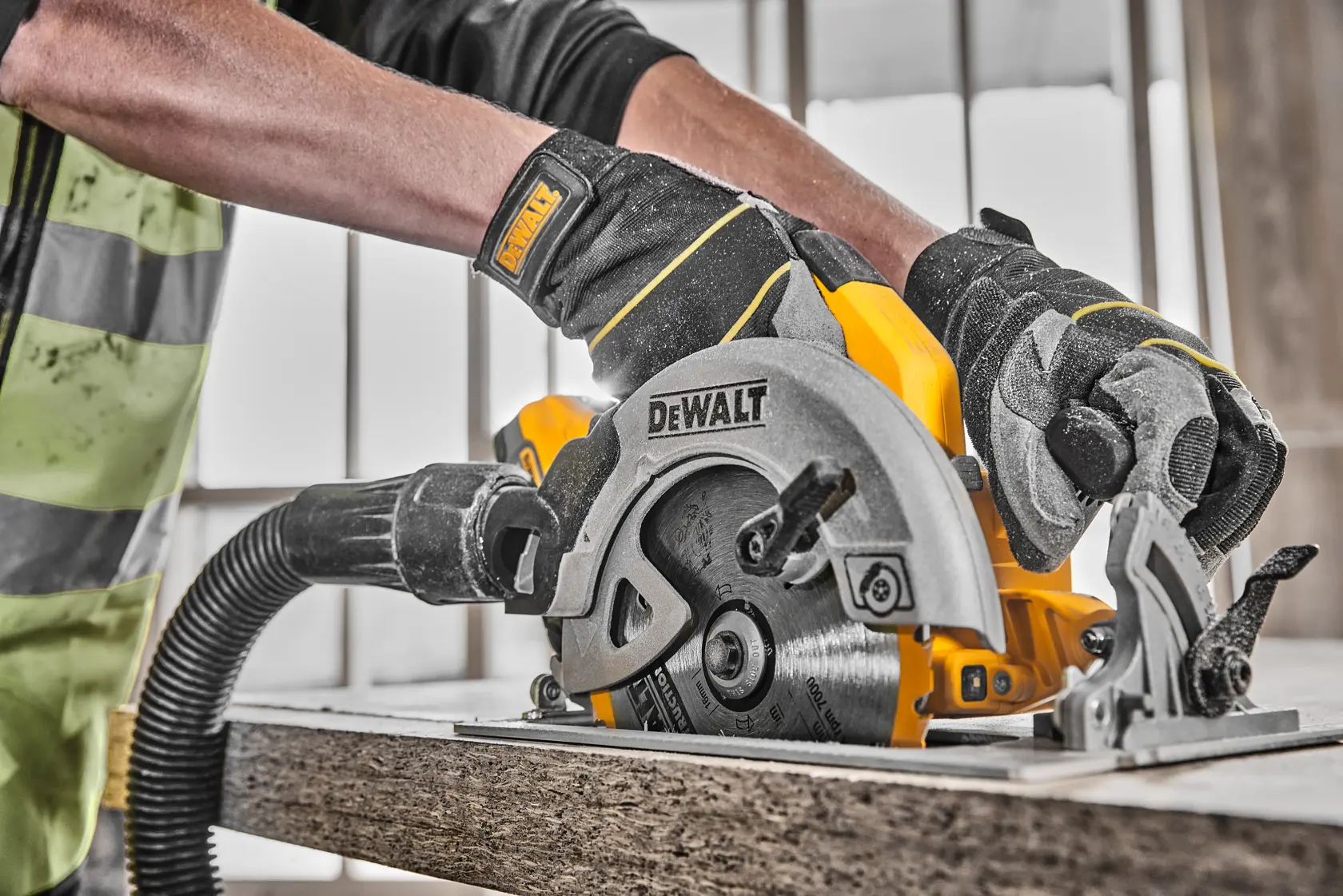 A DEWALT cordless circular saw, featuring a yellow and black ergonomic handle and a blade labeled with DEWALT branding. The saw includes a Power Stack battery and is designed for construction work.