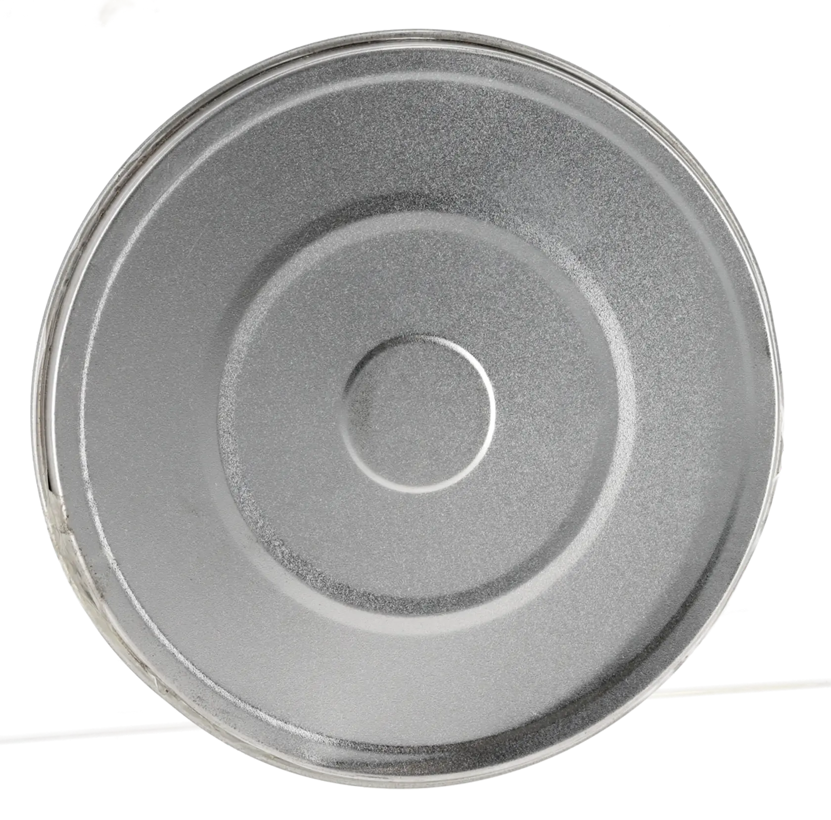 Round metal disc with concentric circles, photographed from above on a plain background.