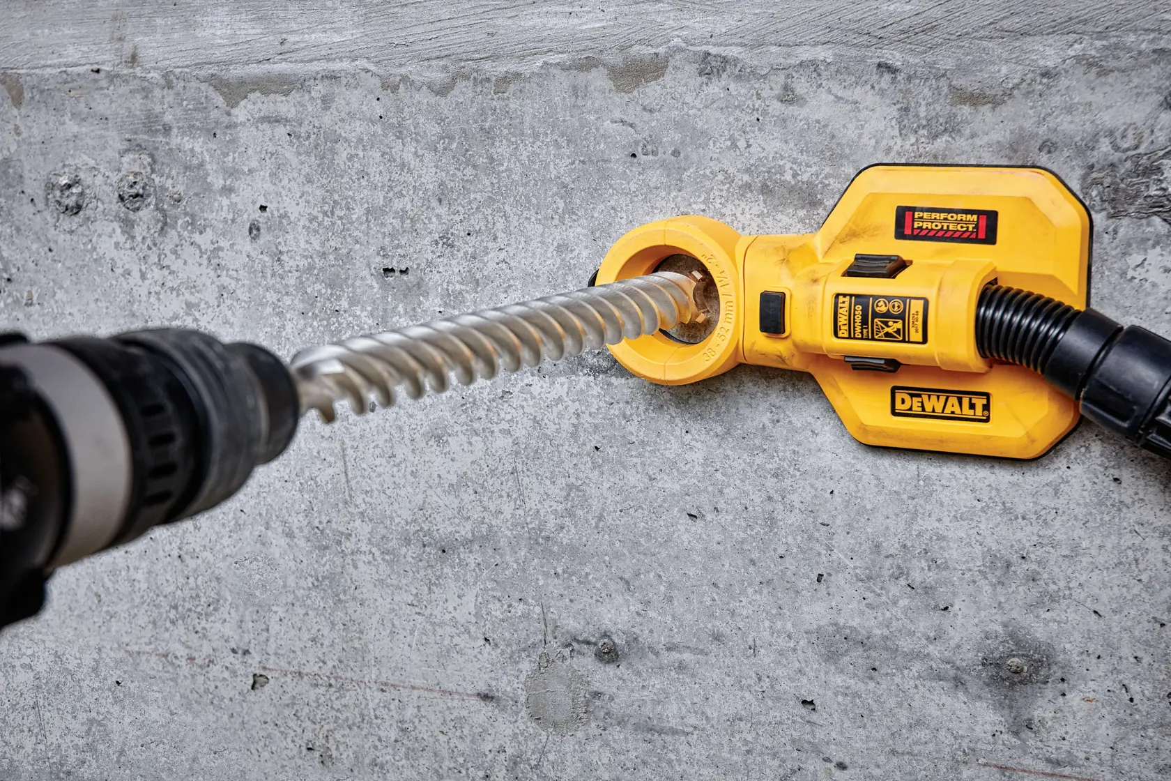 DEWALT SDS-Max carbide drill bit with spiral design for masonry and concrete drilling, shown vertically.